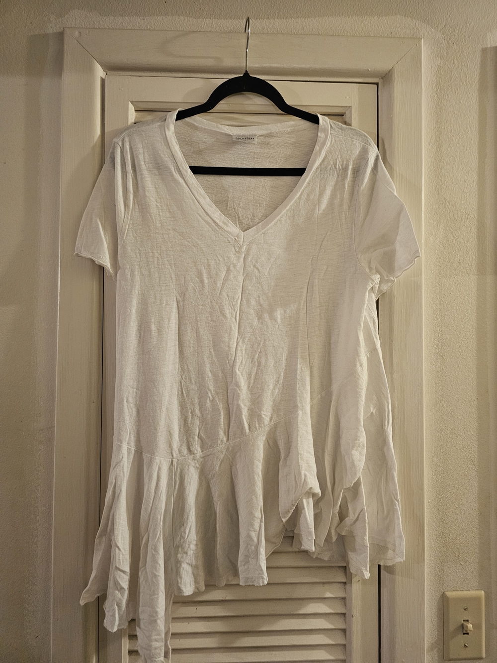Relaxed White V-Neck Asymmetric Ruffle Tunic